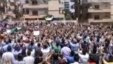This image made from amateur video released by Shaam News Network and accessed Friday, May 25, 2012 purports to show an anti-government protest in Homs, Syria.