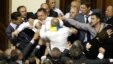 Deputies scuffle during a session in the chamber of the Ukrainian parliament in Kiev, May 24, 2012. 