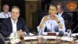 French President Francois Hollande, left, listens as U.S. President Barack Obama speaks at the start of the first working session of the G8 Summit at Camp David, Md., May 19, 2012. 