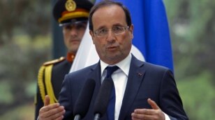 French President Francois Hollande speaks during a news conference in Kabul, May 25, 2012. 