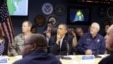 President Barack Obama, center, attends a briefing with Federal Emergency Management Agency administrator Craig Fugate, right, at the National Response Coordination Center at FEMA Headquarters in Washington, on Sunday, Oct. 28, 2012.