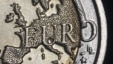 The map of Europe is featured on the face of a two Euro coin seen in this photo illustration.