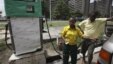 A man buys fuel at a petrol station in Lagos, Nigeria, April 24, 2012. 