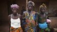 Women who survived the civil war pose for a portrait in the village of Bomaru, where the conflict started in 1991, in eastern Sierra Leone, April 22, 2012.