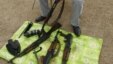 A weapons dealer dismantles AK-47 rifles before selling it to smugglers transferring it to Syria, at his house near the city of Mosul, north of Baghdad, Iraq, February 16, 2012.