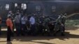 Indonesian soldiers carry a victim of Wednesday's plane crash at Cijeruk in Bogor, West Java, Indonesia, Saturday, May 12, 2012.