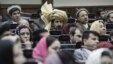 Afghan parliament members listen to a speech by President Hamid Karzai, unseen, during the opening ceremony of the second year of the Afghanistan parliament in Kabul, Afghanistan, Saturday, Jan. 21, 2012.