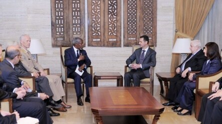 UN-Arab League Joint Special Envoy for Syria Kofi Annan, center left, and Syrian President Bashar Assad, center right, meeting in Damascus, Syria, Tuesday, May 29, 2012.