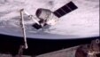 The Canadarm 2 on the International Space Station (ISS) holds the SpaceX Dragon capsule as NASA prepares for final docking/'berthing' with the ISS, May 25, 2012.