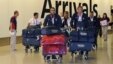 Members of the Italian Olympic squad arrive at Heathrow airport, London, England, July 16, 2012.